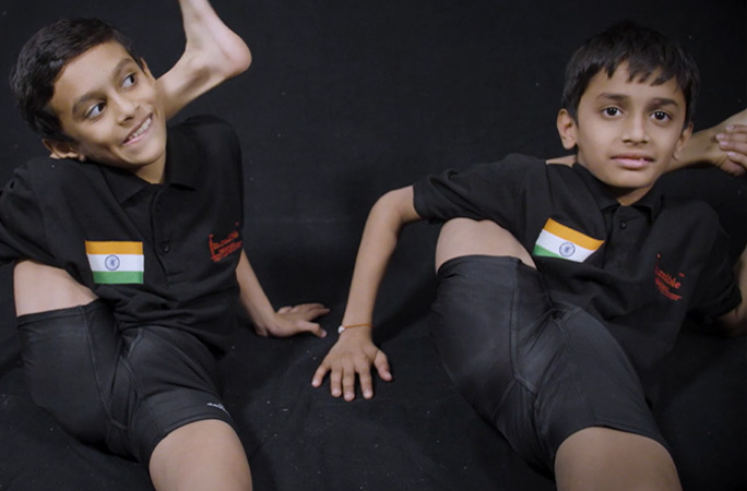fastest time to complete 5 synchronised sequences on a Mallakhamb pole by a team of two (1 minute and 47 seconds)